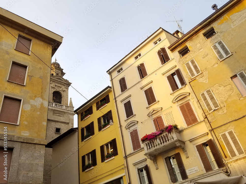 Pastel yellow buildings of Parma, Italy.
