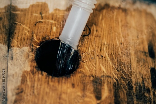 filling barrel in Bourbon Whiskey production