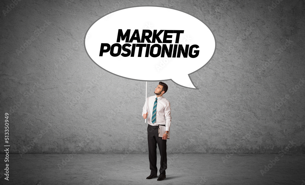 business person in casual holding road sign business person in casual holding road sign