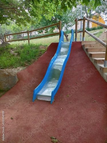 A playground with a colorful slide. photo