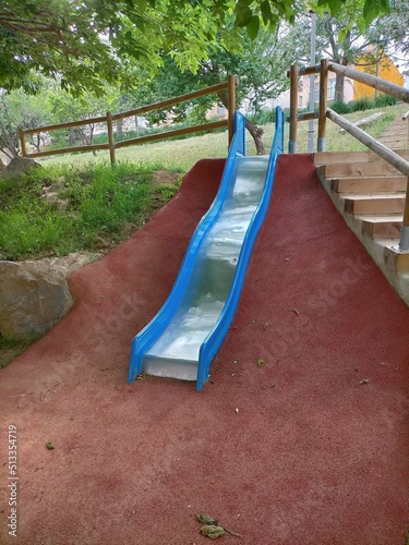 A playground with a colorful slide. photo