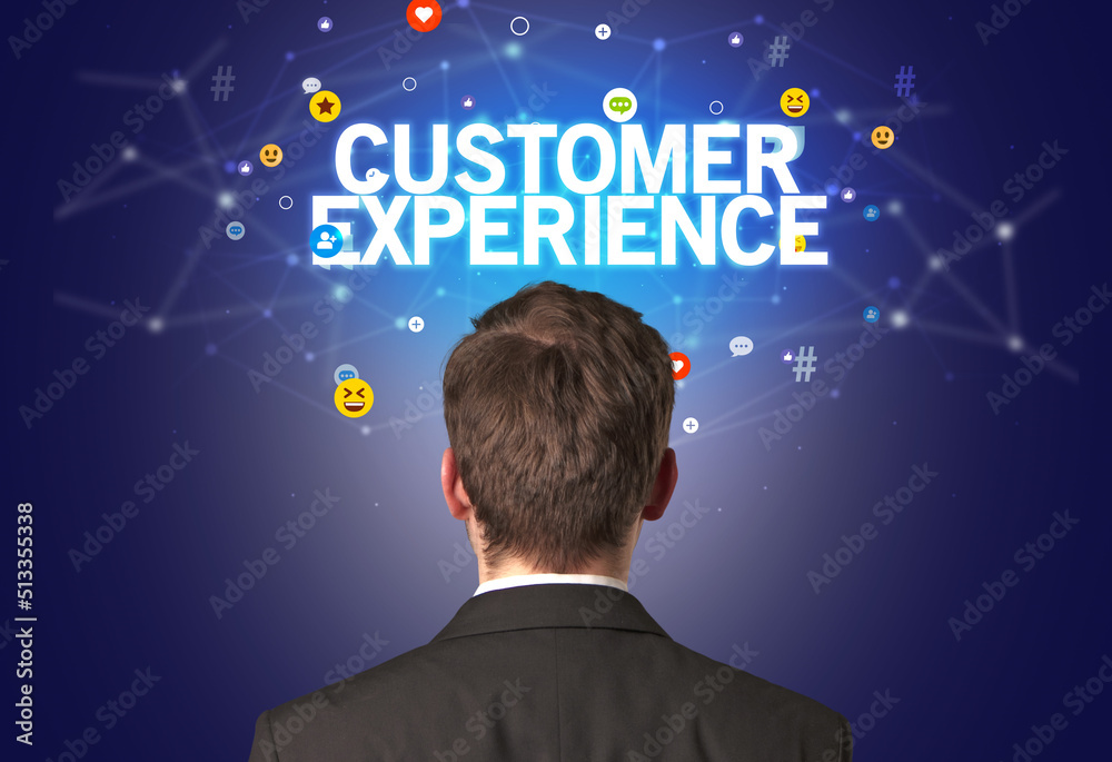 Rear view of a businessman, social media concept Rear view of a businessman, social media concept
