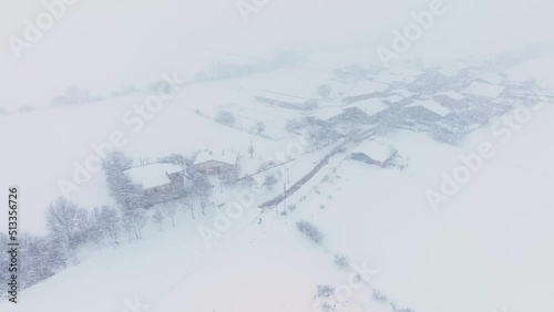 Landscape with snow in the megalithic monument Dolmen de Sorginetxe (House of Witches) in the town of Arrizala in the Llanada Alavesa. Alava, Basque Country, Spain, Europe photo