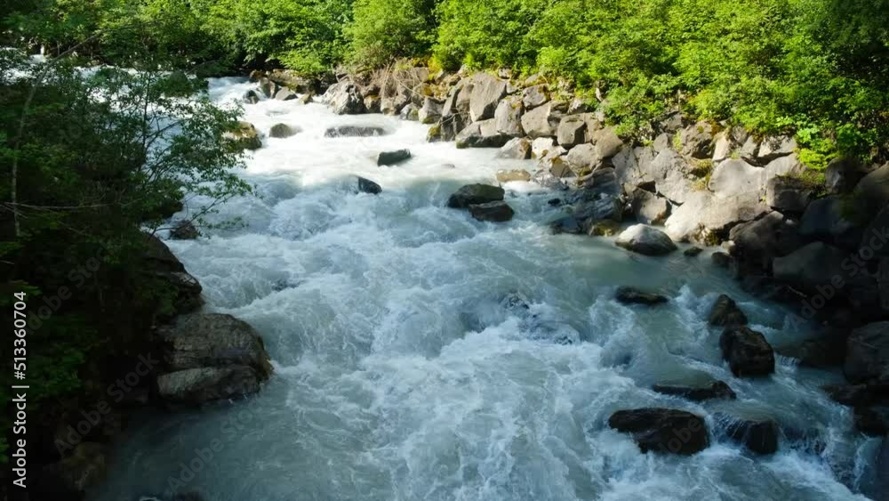 A handheld footage taken of Kander River water flow in the morning. It is 44 kilometres long and has a watershed of 1,126 square kilometres 