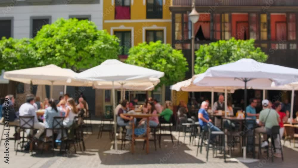Defocused view of the traditional European outdoor cafe in summer