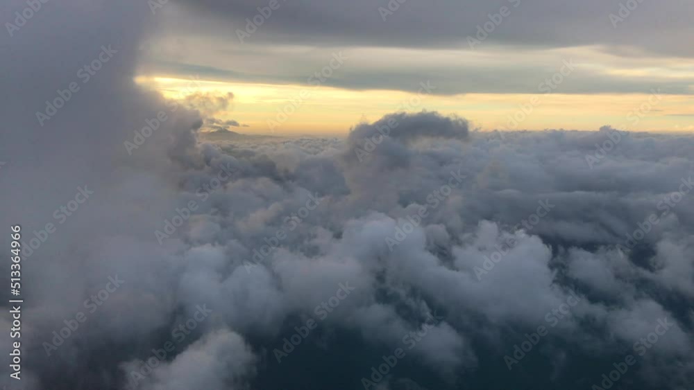 Flight over the cloud Incredibly beautiful landscape, mist ann foggy in the rays of the setting sun. Flight over the cloud Incredibly beautiful landscape, mist ann foggy in the rays of the setting sun.