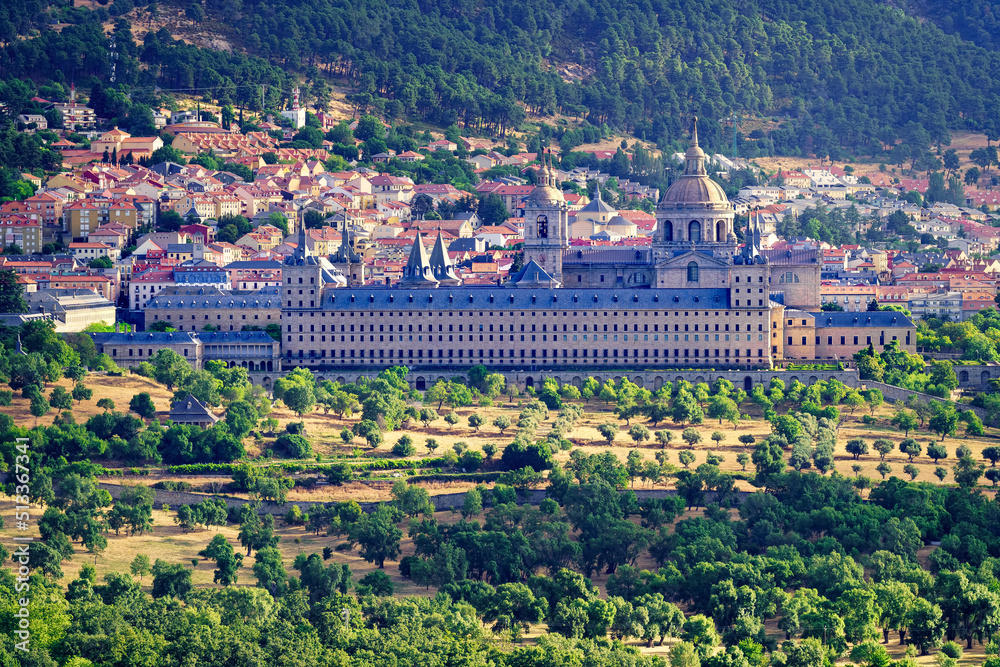 Monastery of El Escorial between mountains located in Madrid, Spain.