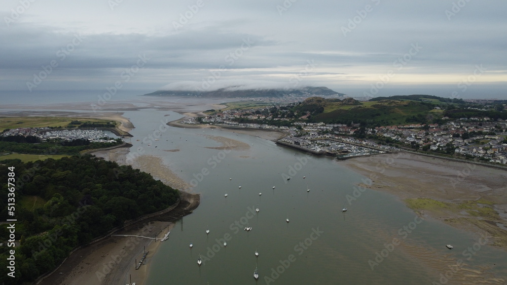 View of Canwy Cale and boats on the sea in Wales.