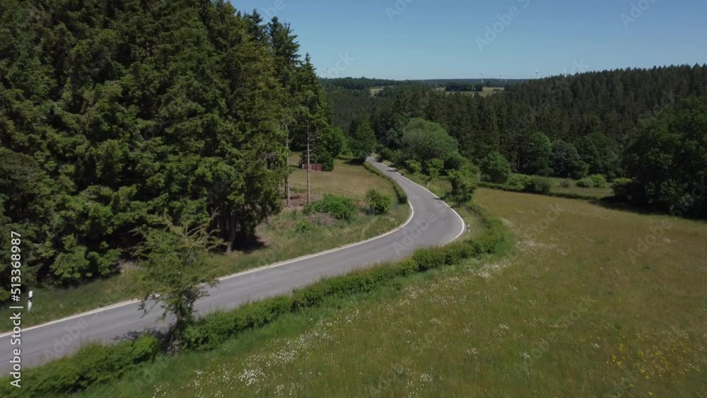 Road in nature reserve Eifel in Germany near Kalterherberg, hills and forest Road in nature reserve Eifel in Germany near Kalterherberg, hills and forest