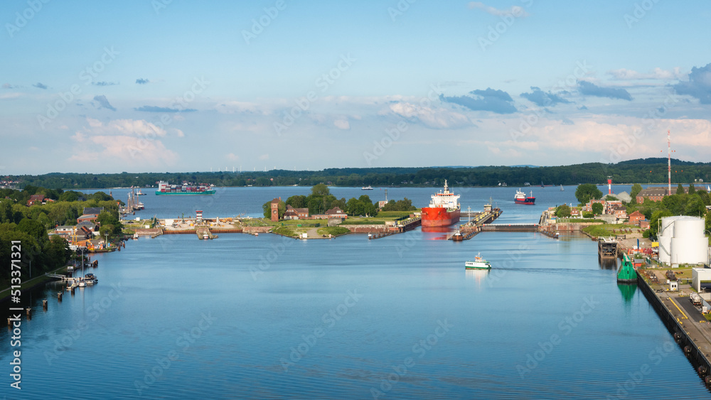  View on and from the Kiel Canal bridge in northern germany on a sunny summer day