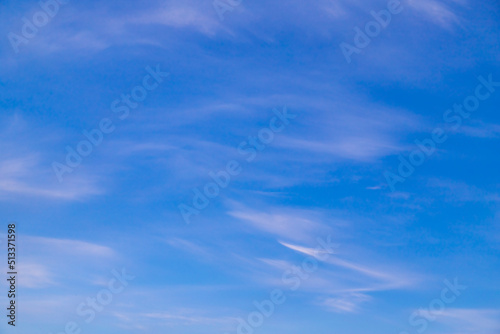 Blue sky cirrus clouds.