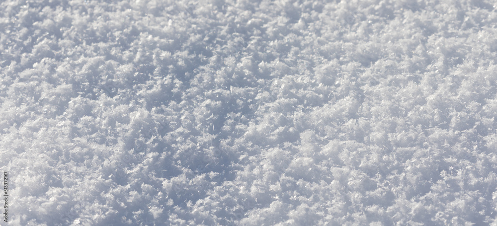 Macro view crystal snowflakes. Winter season decorative nature frame snow texture. shallow depth of field.