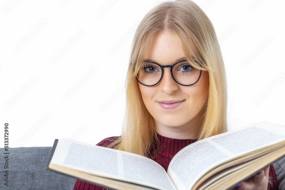 Portrait of young woman with glasses and an open book closeup. Isolated on white background. Portrait of young woman with glasses and an open book closeup. Isolated on white background.
