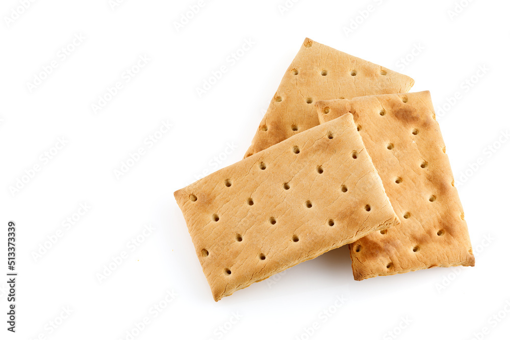 Pile of rectangular biscuits isolated on white background. Full depth of field. Close-up. Pile of rectangular biscuits isolated on white background. Full depth of field. Close-up.