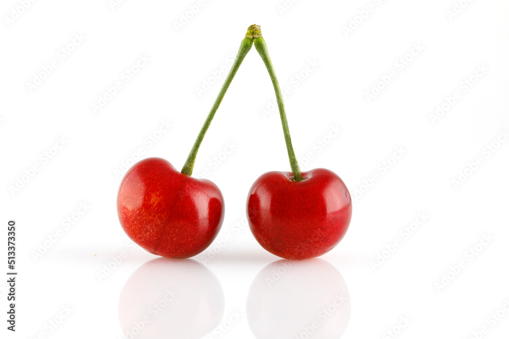 Sweet cherry isolated on white background. Two sweet cherries with on white background. Full depth of field. Close-up Sweet cherry isolated on white background. Two sweet cherries with on white background. Full depth of field. Close-up