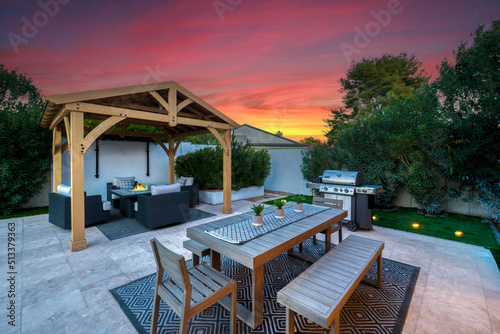 A luxury vacation property at sunset photo