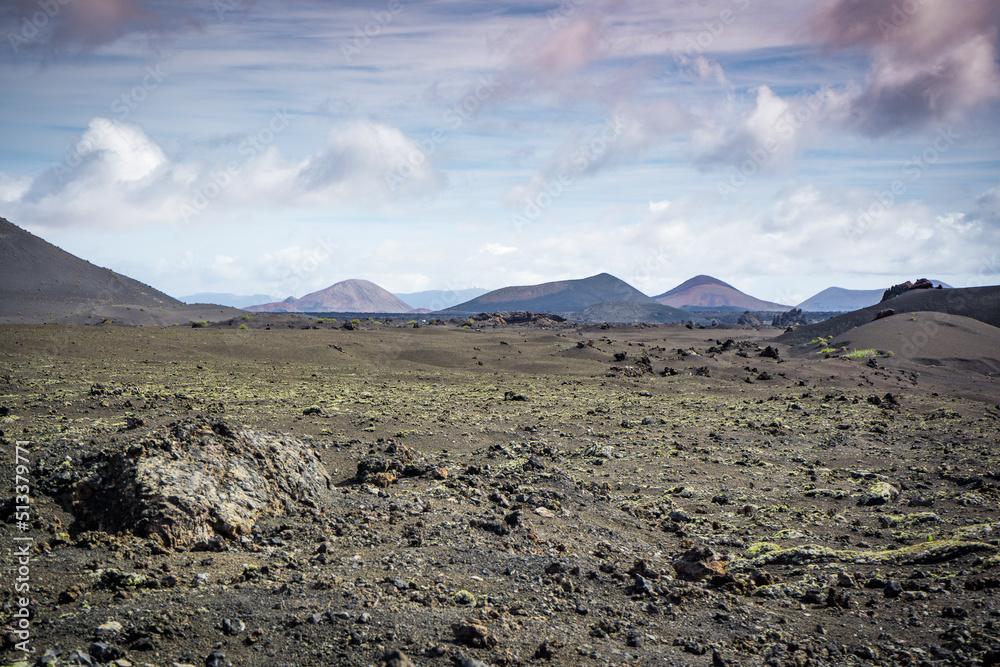 moonlike volcanic landscape with volcanos and mountains on lanzarote