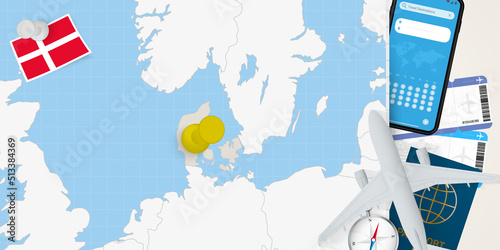 Travel to Denmark concept, map with pin on map of Denmark. Vacation preparation map, flag, passport and tickets.