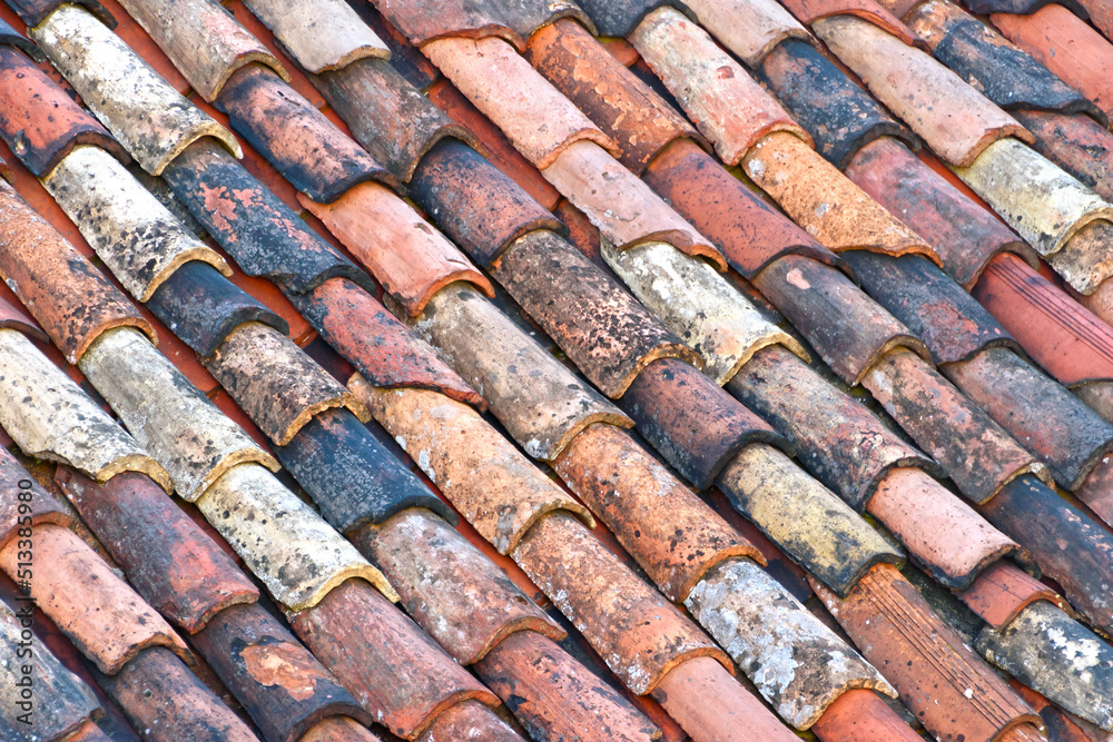 old, damaged and dirty roof tiles old, damaged and dirty roof tiles