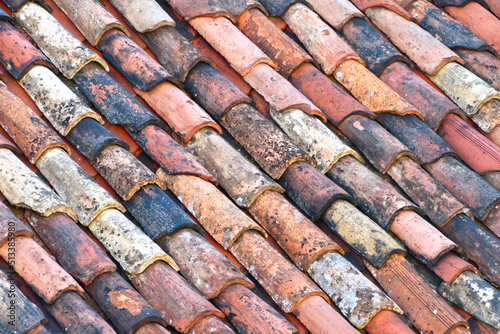 old, damaged and dirty roof tiles