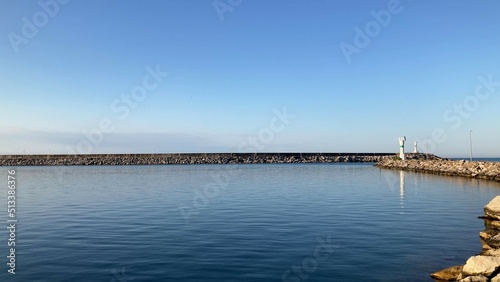 A background photo with a dyke in the sea