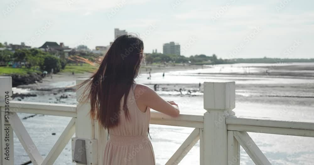 Woman look at the sea in Bali of Taiwan