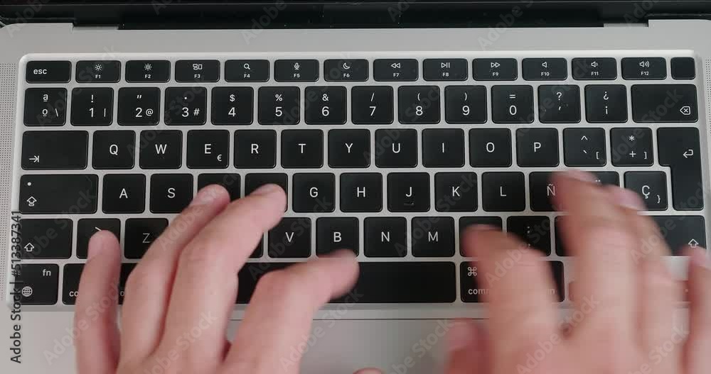 Man works on new project typing unique content on laptop Man works on new project typing unique content on laptop