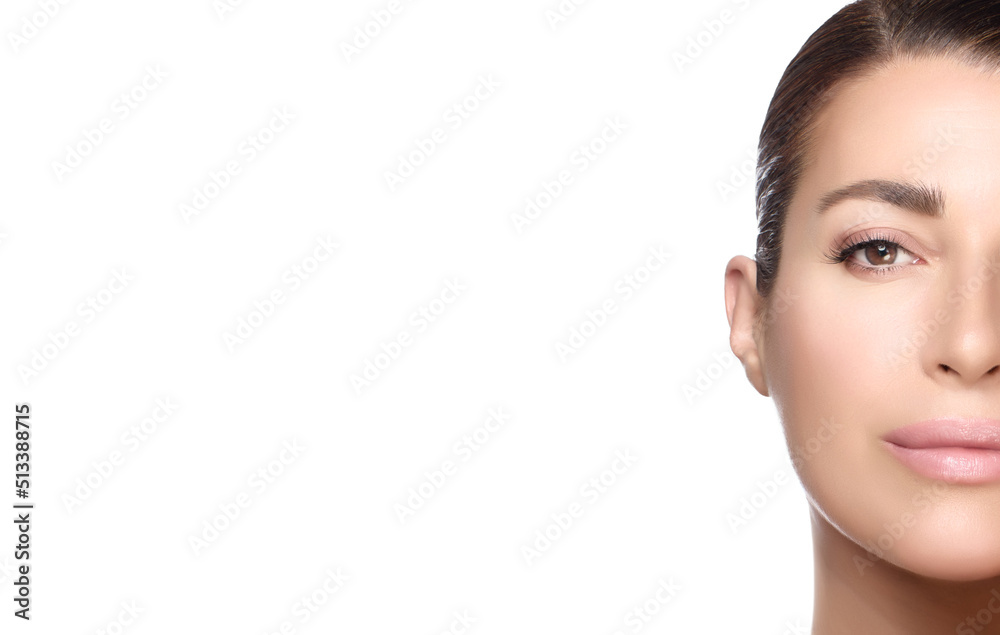 Fototapeta premium Beauty and Skincare Concept. Beautiful natural young woman face with nude makeup on a flawless skin
