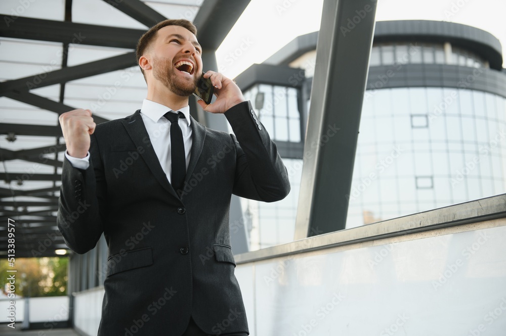 Businessman exulting for his success Businessman exulting for his success