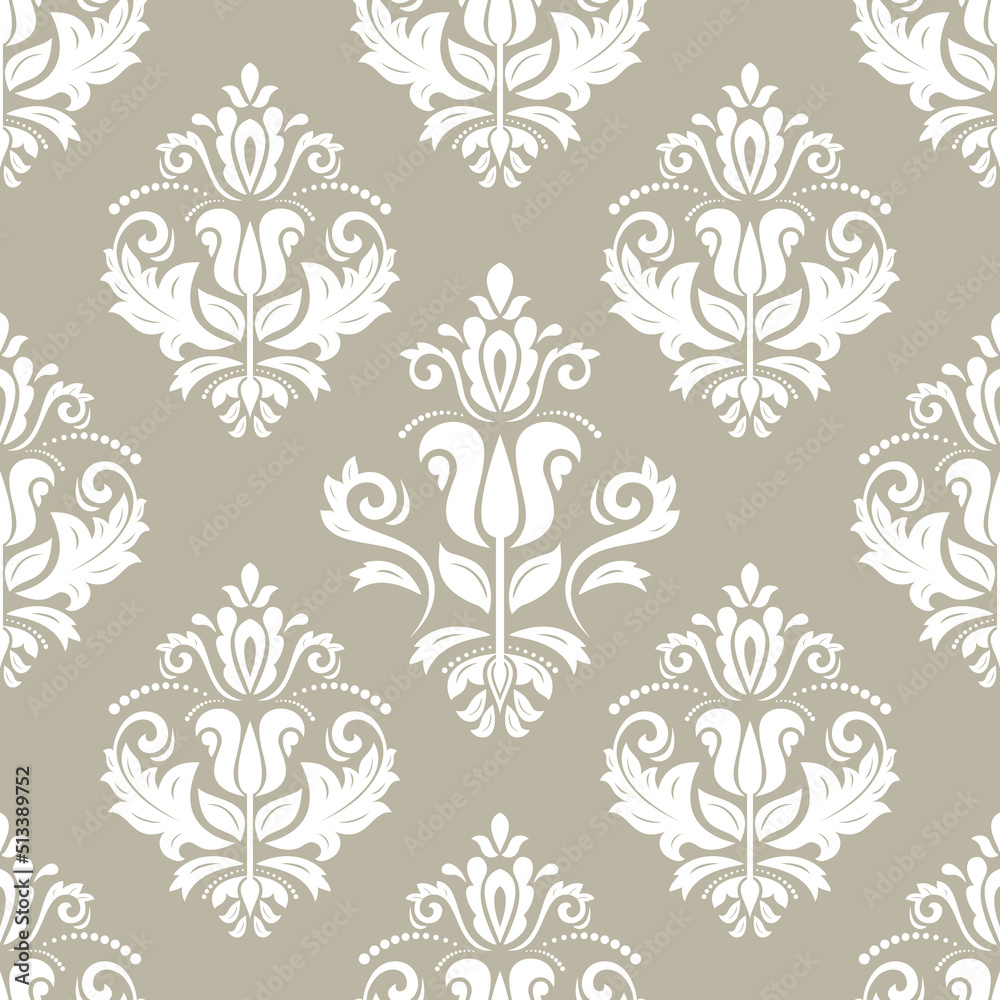 Classic seamless white pattern. Damask orient white ornament. Classic vintage background. Orient ornament for fabric, wallpaper and packaging Classic seamless white pattern. Damask orient white ornament. Classic vintage background. Orient ornament for fabric, wallpaper and packaging