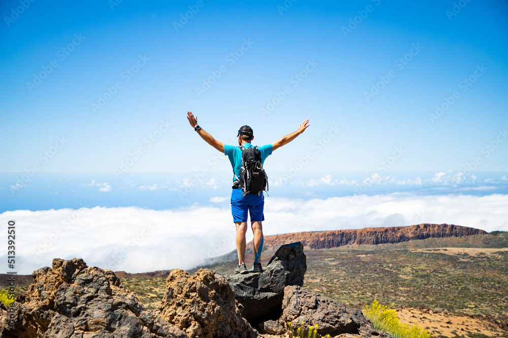 man hiking in El Teide national park Tenerife man hiking in El Teide national park Tenerife