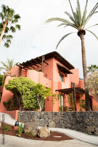 ABAMA, TENERIFE - 01 JUNE, 2022: pink buildings of the Ritz Carlton  Tenerife photo