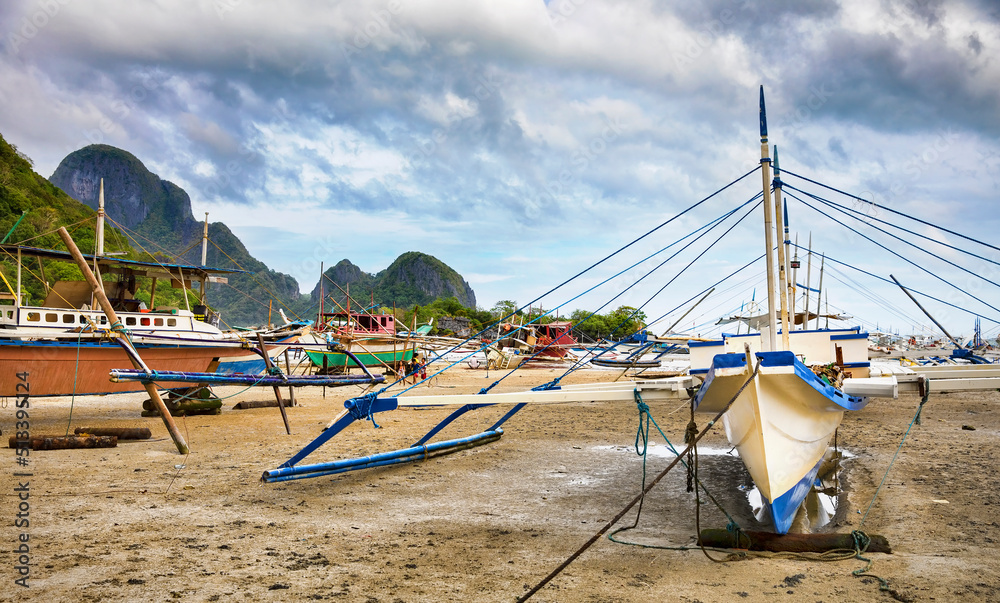 Traditional Boats on the Shore of El Nido, Palawan, Philippines Traditional Boats on the Shore of El Nido, Palawan, Philippines
