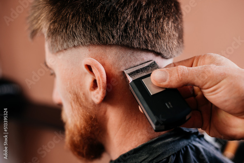 Shaving the back of the head in a barbershop