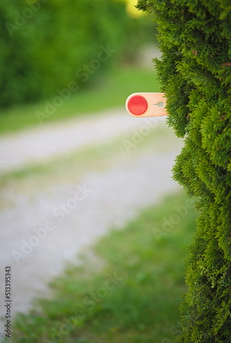 A reflective warning sign on the bend of the village road photo