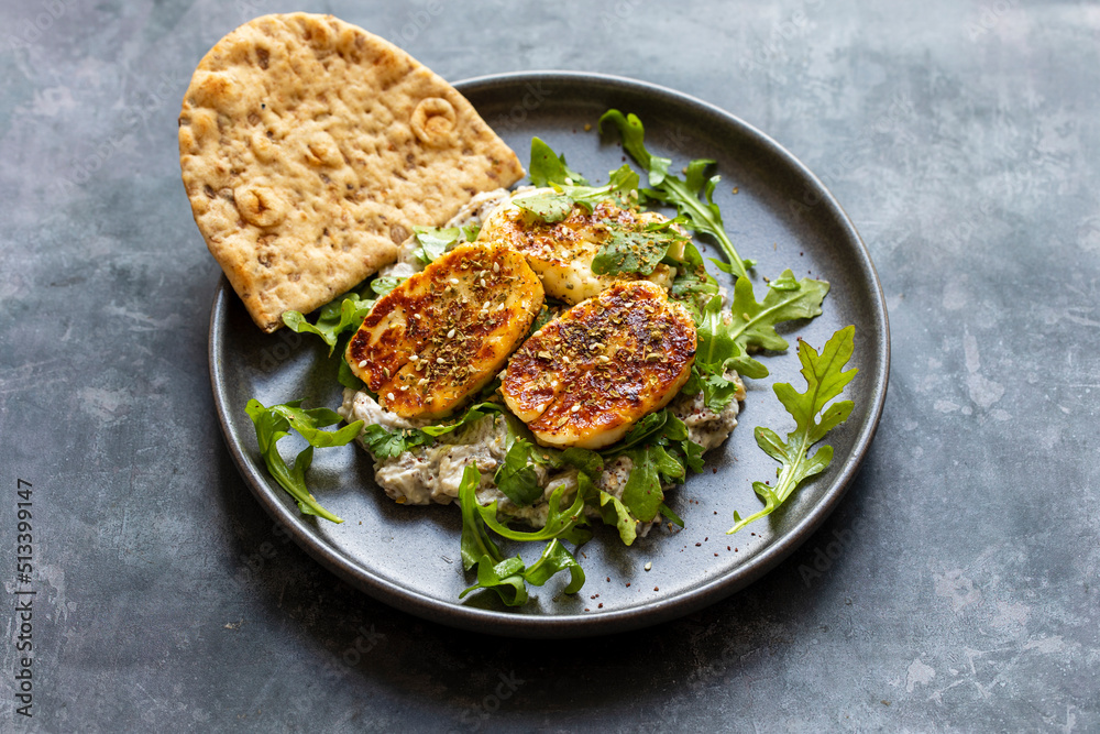 Aubergine and yogurt dip with halloumi and zaatar mix Aubergine and yogurt dip with halloumi and zaatar mix