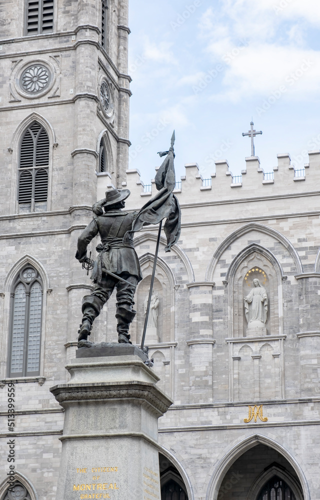 Statue of Paul de Chomedrey in Place d'Armes with Notre-Dame Cathedral as Backdrop
