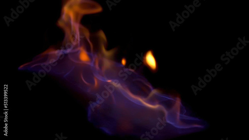 Close up horizontal view for blue and red burning fire, isolated on black background. Beautiful, hypnotic, mystical, red and blue flame. © Media Whale Stock