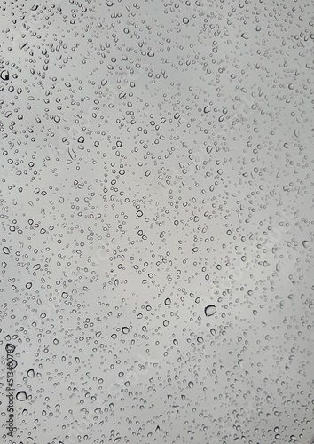 Raindrops on the top window (glass). Water drops on background.