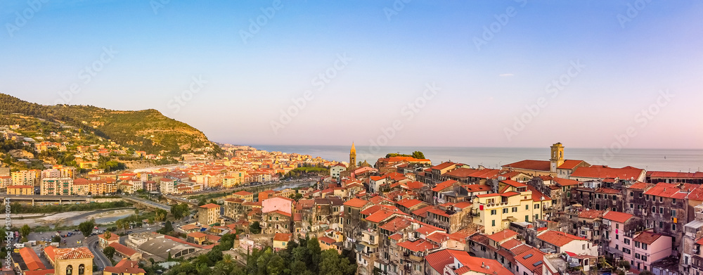 Obraz premium Aerial drone shot of old and new town, city of Ventimiglia, Liguria, Italy Beautiful panoramic aerial view from flying unmanned aerial vehicle of Ligurian Riviera
