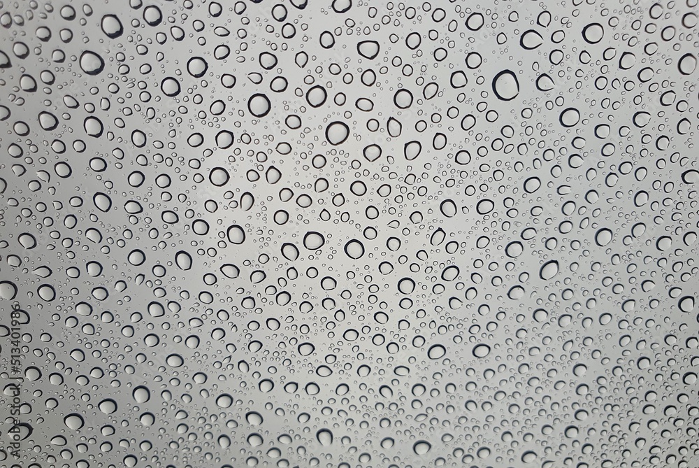 Raindrops on the top window (glass).
Water drops on background. Raindrops on the top window (glass).
Water drops on background.