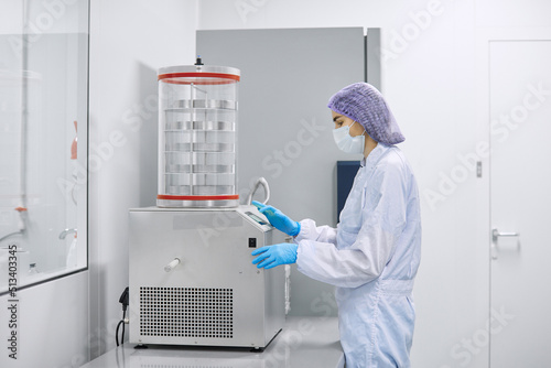 Wallpaper Mural A laboratory worker conducts research on biomaterial Torontodigital.ca