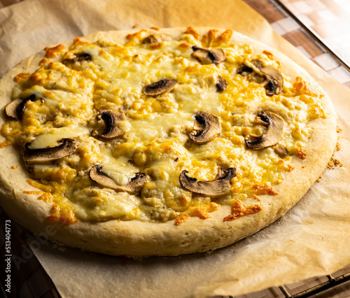 Fresh Italian pizza with cheese sauce and mushrooms. Pizza 5 cheeses photo