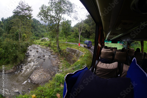Ngeprih River seen from inside the bus. Located in Pujon, Malang, Indonesia photo