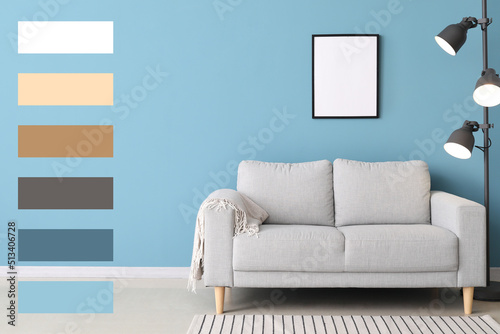 Stylish sofa and lamp near ...