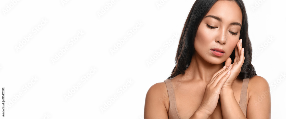 Obraz premium Pretty Asian woman on white background with space for text