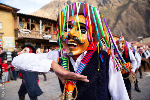Ollantaytambo, Urubamba - Peru - June 6st 2022: Members of the dance called The Chileans, during Choquekillka Christ festivities. This is a public dance making fun of the Chilean soldiers in Cusco. photo