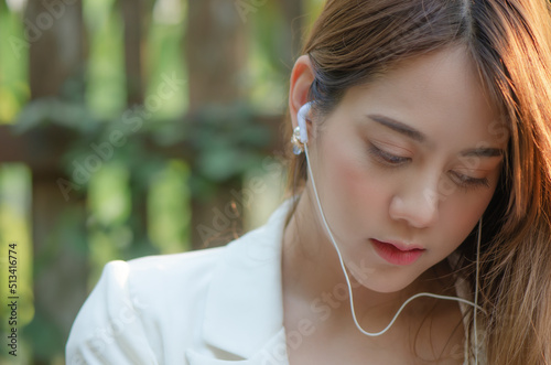 woman use earphones for listen music and relax