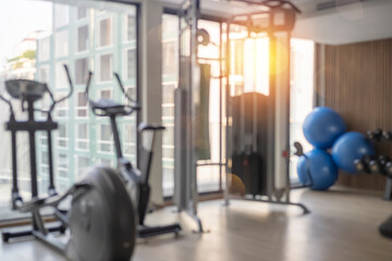 Fotobehang Fitness Wazige sportschool achtergrond voor banner  © jittawit21