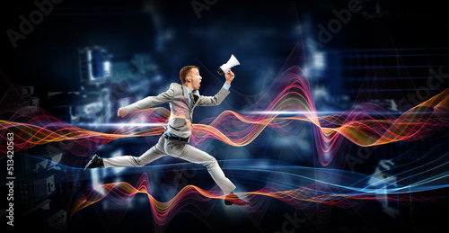 Portrait of energetic businessman jumping in open air © Sergey Nivens